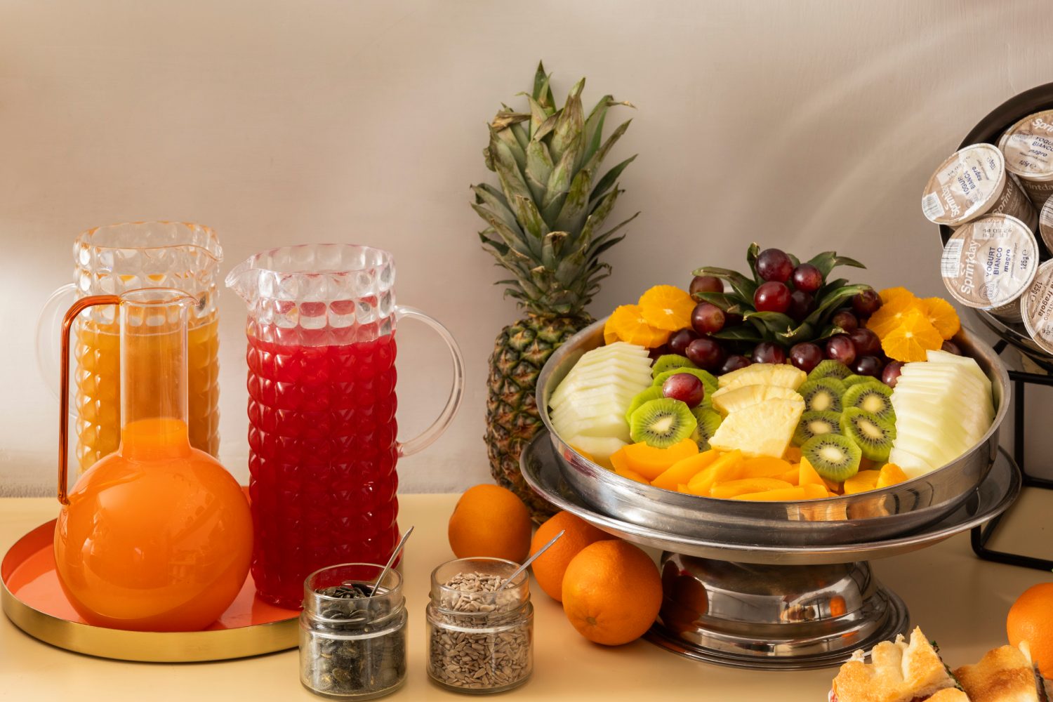 Selection of fruit juices and fresh fruit for breakfast - Barberini Retreat Boutique Hotel - BZAR hotel in Rome